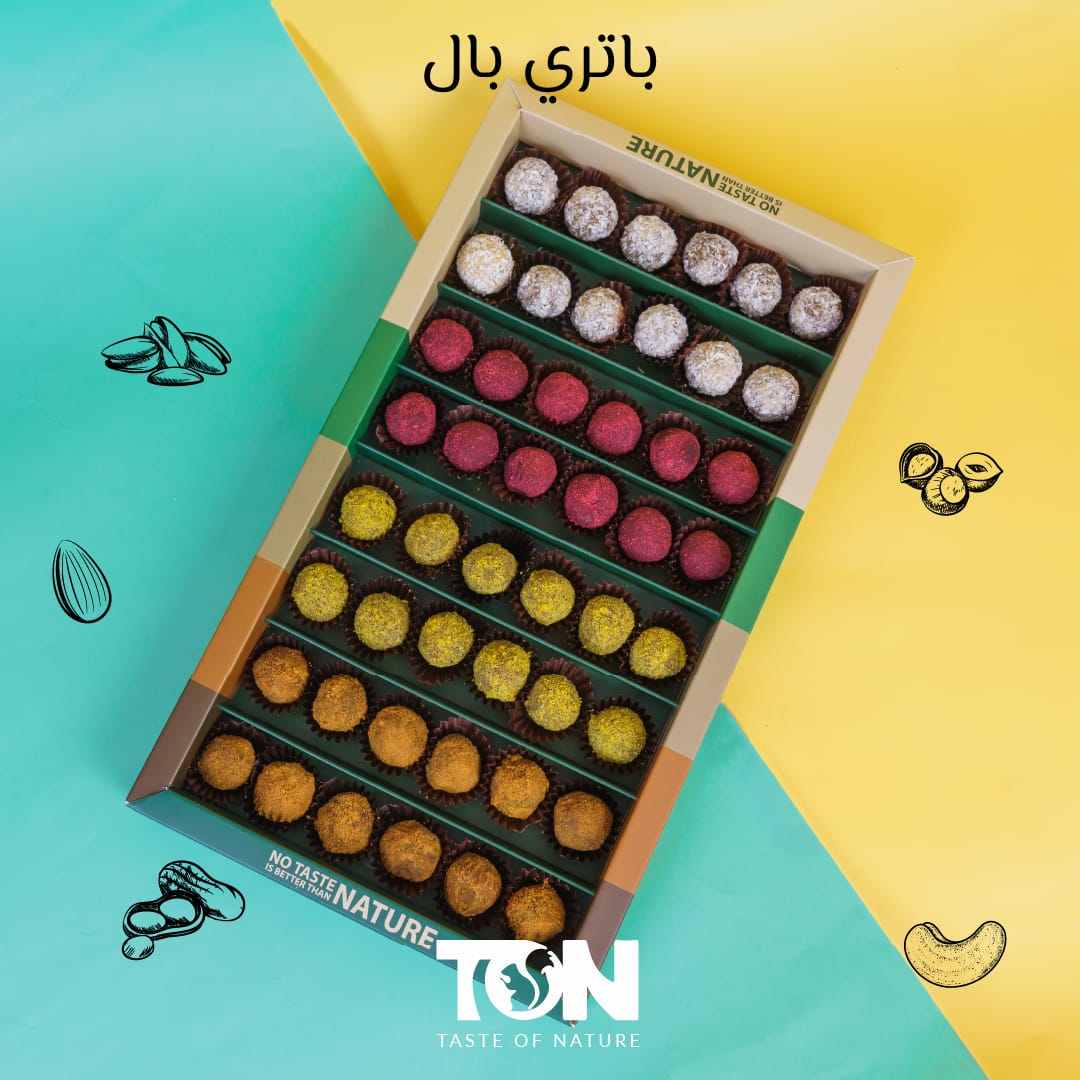 علبة كرات التمر الفاخرة المحشوة بزبدة المكسرات - 4 نكهات