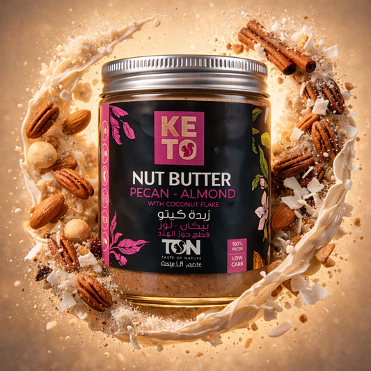 Jar of keto nut butter surrounded by pecans and coconut flakes KUWAIT - TON