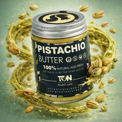 Jar of pistachio butter with pistachios around on a green background